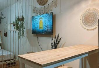 Boho Themed 1BR Condo near PH Arena and SM Marilao has Balcony rooms