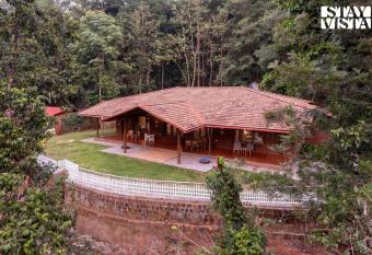 StayVista at Villa Estuaire with Bathtub has rooms with a private hot tub