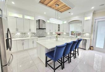 Executive Vacation Home has rooms with a private hot tub