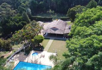 Casa Guacuri - Casa de temporada e eventos has Balcony rooms