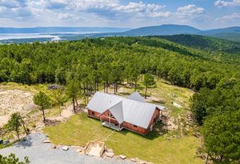 Log Cabin with Million Dollar Mountain sunset views has rooms with a private hot tub