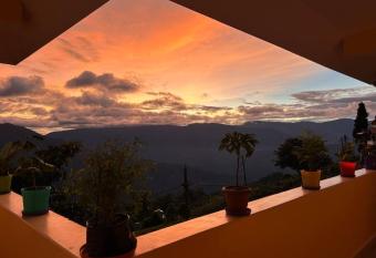 Ejam House, with a tea garden view has Balcony rooms