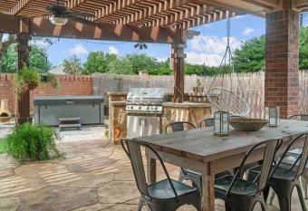 Little Elm Paradise w/ Hot Tub, Cinema and Games has rooms with a private hot tub