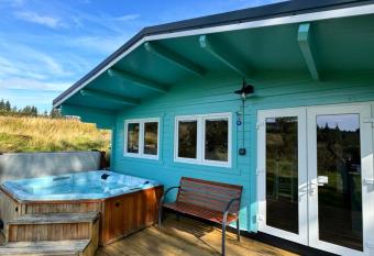 Glenariff Forest Pine Cabin has rooms with a private hot tub