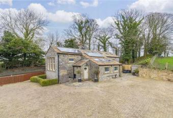 old school house has rooms with a private hot tub