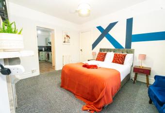 Bright Medway studio flat opposite Chatham station allows 18 year olds to book a room