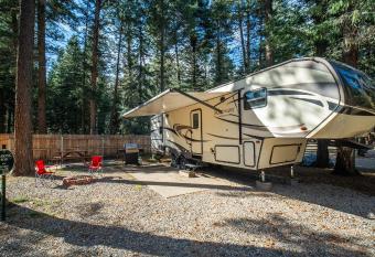 Fully Setup RV for Glamping #105 at Blue Spruce RV Park & Cabins allows 18 year olds to book a room
