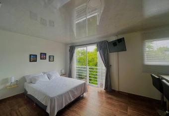 Acogedor e Iluminado apto cerca a ukumary estadio expofuturo has Balcony rooms