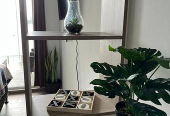 Airport Apartment la Aurora Guatemala has rooms with a private hot tub