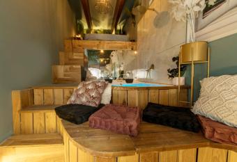 A place to relax -                                                                                                         has rooms with a private hot tub