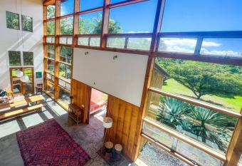 Oceanside Glass Villa on Three Gorgeous Acres! has Balcony rooms