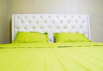 The Vacation Homes Apartments has rooms with a private hot tub