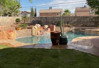 Amazing home with custom-built pool has rooms with a private hot tub