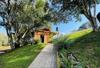 Casinha charmosa e muito verde em Bom Princ  pio has Balcony rooms