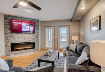 Family Dreams - Lakefront, 2-bedroom, multi-level condo, Winter Vacation has rooms with a private hot tub