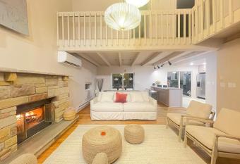 Poconos Modern Chalet~Hot Tub~Home Theater~Lake has rooms with a private hot tub