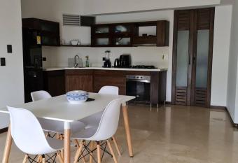 Sabaneta-Apto familiar has rooms with a private hot tub