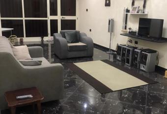 Merry s Cozy Furnished Apartment has rooms with a private hot tub