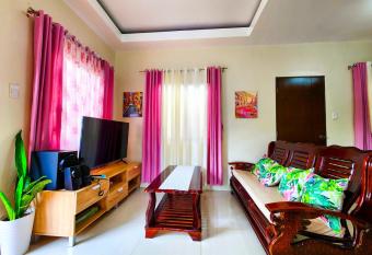 Serene 2BR Escape: Poolside Bliss in Iloilo City allows 18 year olds to book a room