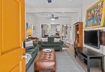 Lenoir Cottage with covered patio and fire pit allows 18 year olds to book a room