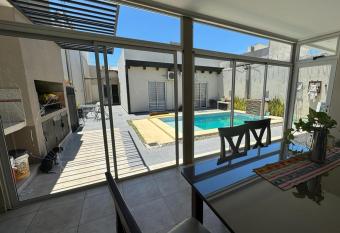 Casa hermosa,comoda, luminosa has Balcony rooms