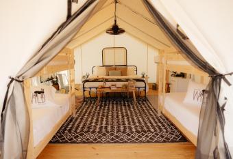 Deluxe Glamping Tents at Lake Guntersville State Park allows 18 year olds to book a room