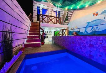 affordable 2 bedroom rest house w/ pools & parking has Balcony rooms