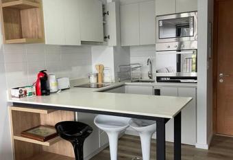 Departamento a orillas del lago has Balcony rooms