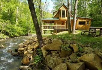 Log Cabin on the River has Balcony rooms