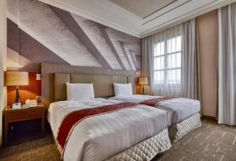 Golden Tulip - Aesthetics has rooms with a private hot tub