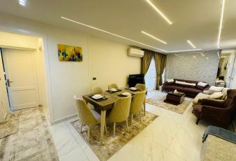 Madinaty Hotel Apartment has rooms with a private hot tub