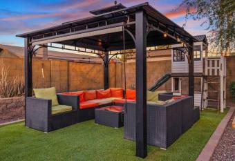 Heated Pool + Hot Tub + Arcade Games + Sleeps 12 has rooms with a private hot tub