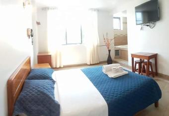 plaza inn has rooms with a private hot tub