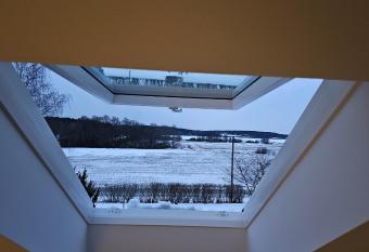 Attic floor with views over fields and sea has Balcony rooms