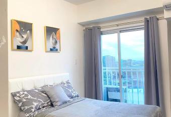 Condo Beside Abreeza Ayala Mall has Balcony rooms