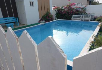 Comfortable house with pool close to the beach has Balcony rooms