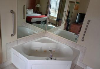 Samir Stay At Nw Expressway has rooms with a private hot tub