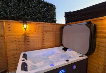 Hot Tub Retreat - has rooms with a private hot tub