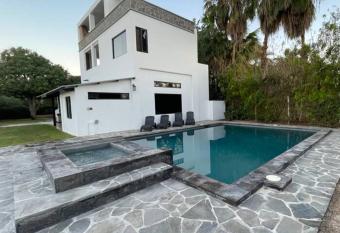 Family Gathering House w/Luxury Kitchens near Surf has rooms with a private hot tub