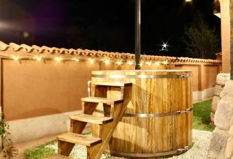 Hot tub cabin at Sacred Valley has rooms with a private hot tub