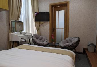 UMUGANO House Inn - Villa has rooms with a private hot tub