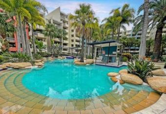 Large studio balcony, spa & pool has rooms with a private hot tub