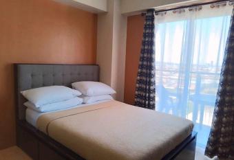 Condo Unit with Balcony @ Sunvida across SM City allows 18 year olds to book a room