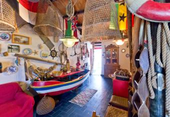 Bohemian Seafront Boathouse allows 18 year olds to book a room