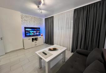 White & Elegant Luxury Apartament Decomandat allows 18 year olds to book a room