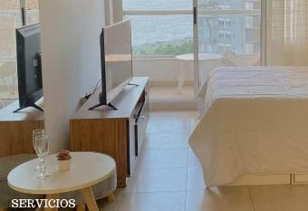 hermoso dpto. con vista al rio has Balcony rooms