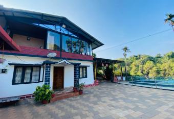 Pool Villa of COORG has rooms with a private hot tub