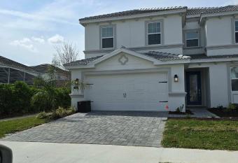 Dazzling 6 Bedroom home with Pool close to Disney has rooms with a private hot tub