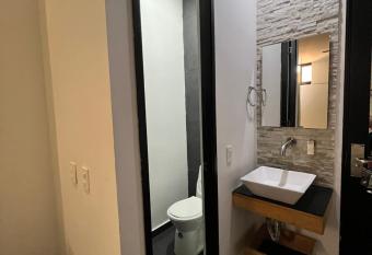 Hotel Medellin Art has rooms with a private hot tub