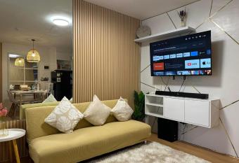 Raven s Nest Cozy Condo with Netflix Wi-fi in Imus has Balcony rooms